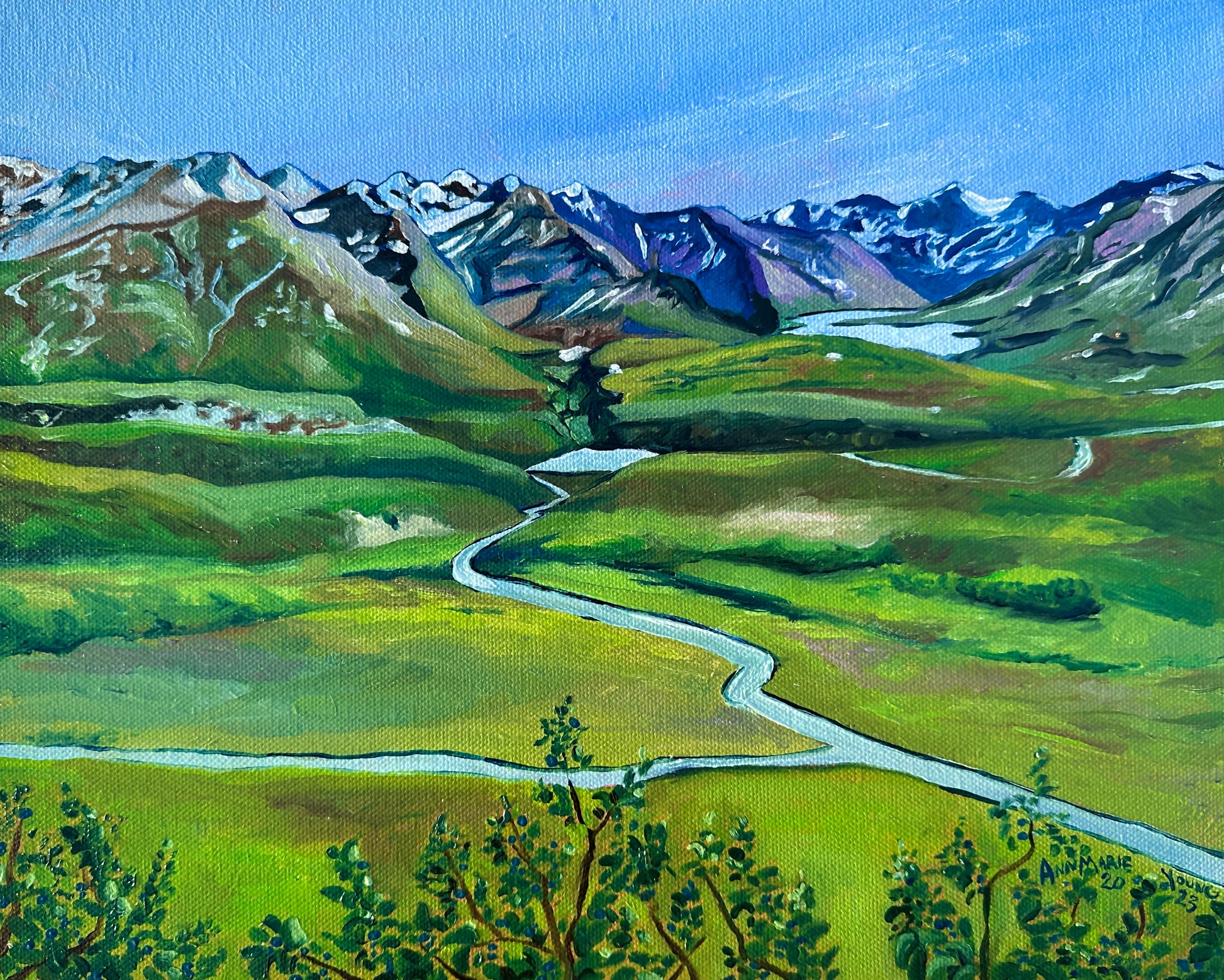 Landscape painting of lush green fields leading up to a mountain range in Alaska, by artist AnnMarie Henderson