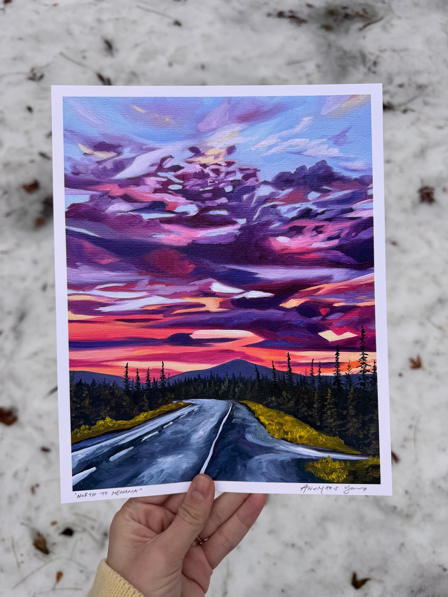 A print of a painting depicting a sunset over an Alaskan road. Colorful landscape painting by AnnMarie Henderson