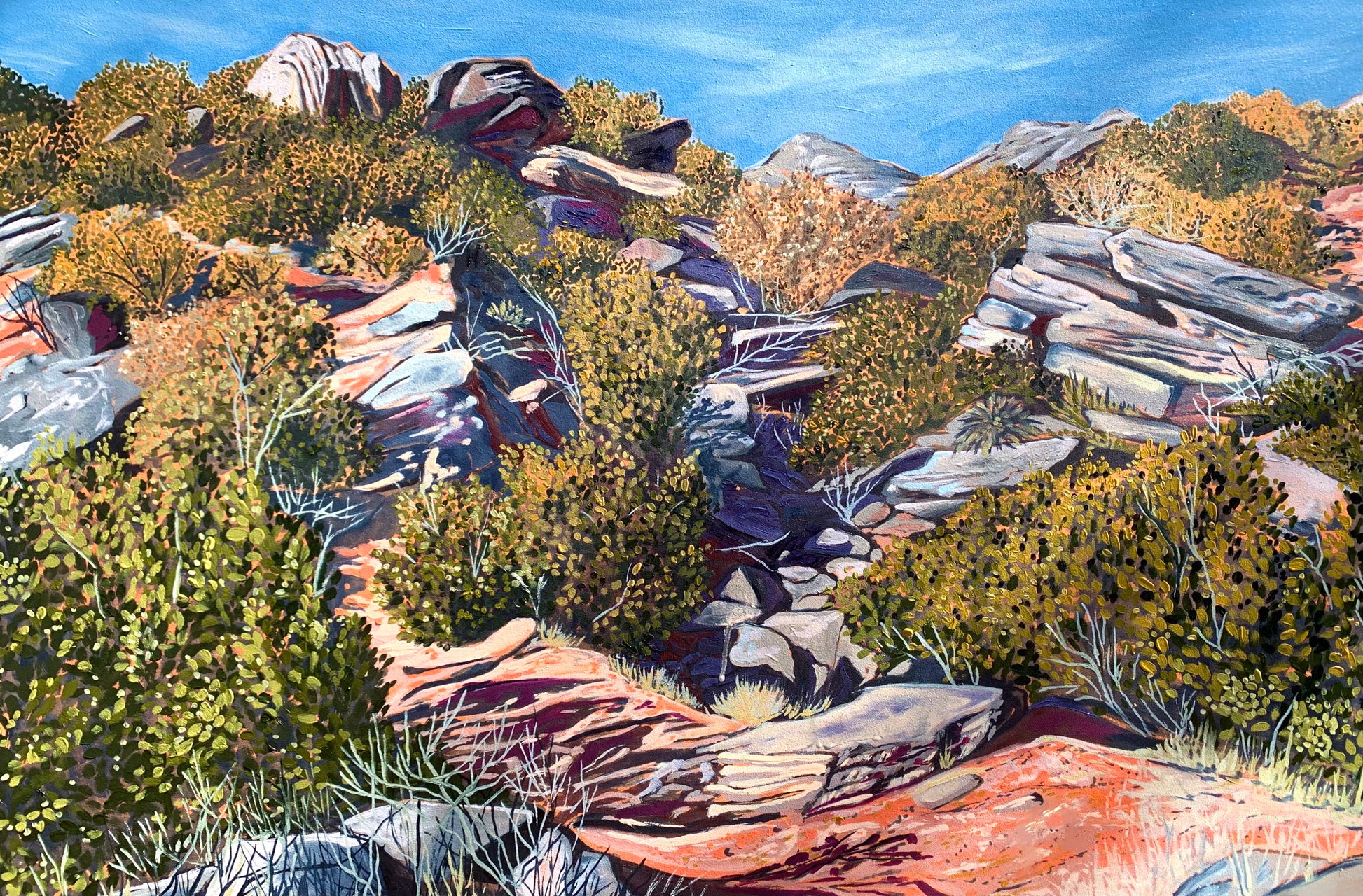 Painting of Texan landscape, filled with colorful greenery and rock formations, under a blue sky by artist AnnMarie Henderson